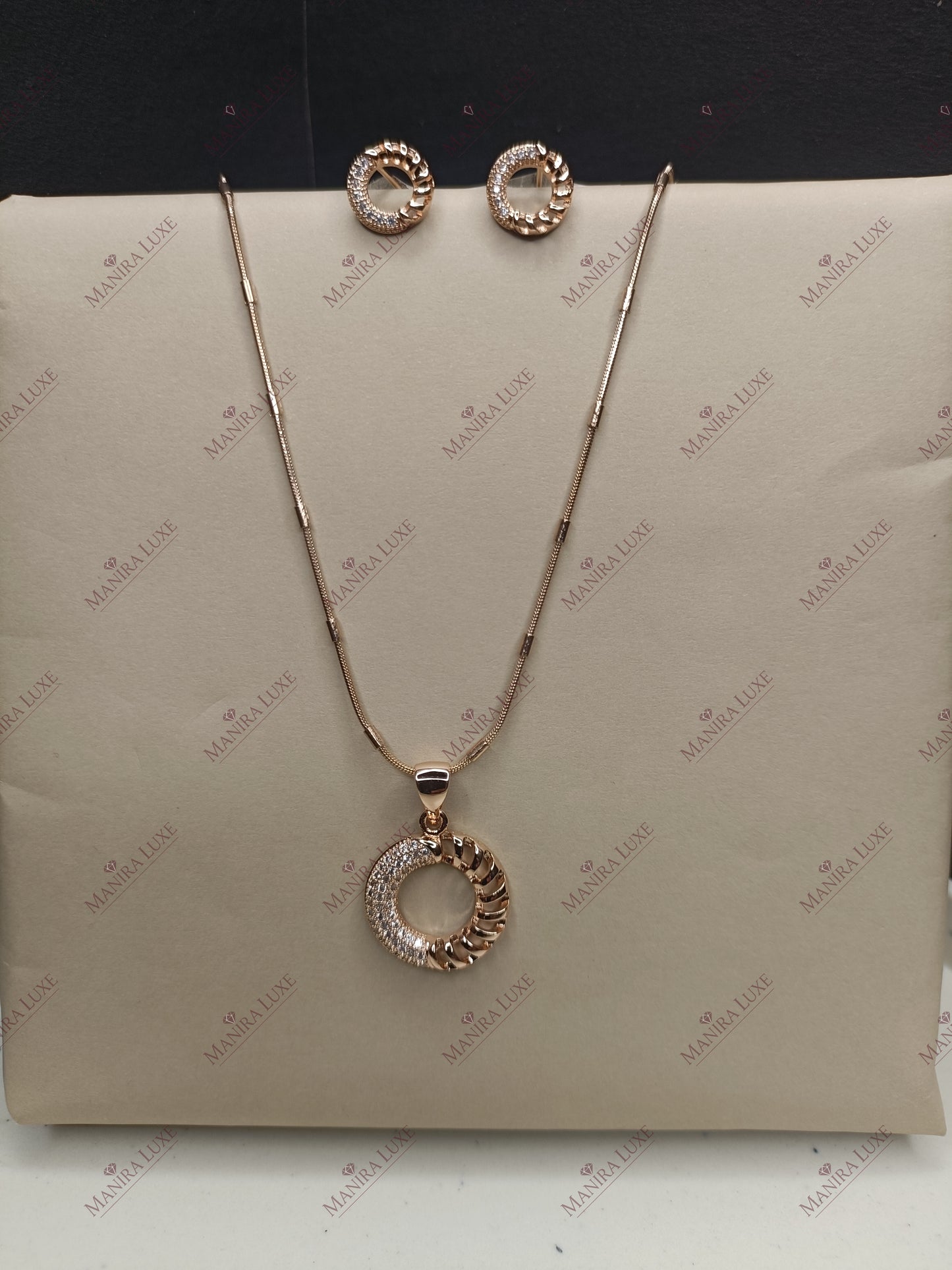 RADIANT ORBIT ROSE GOLD NECKLACE WITH EARRINGS