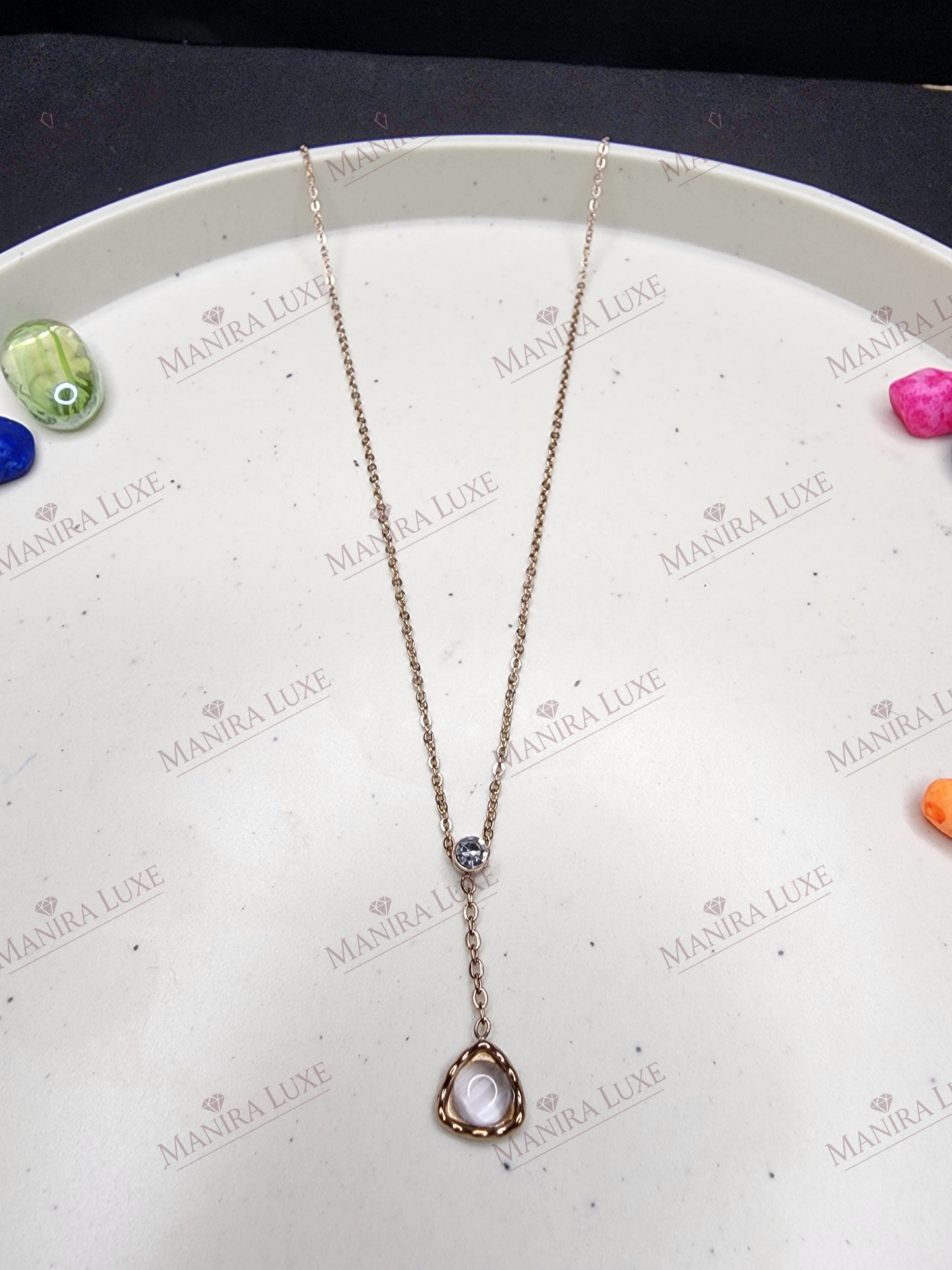 STELLAR PENDULUM ROSE GOLD NECKLACE