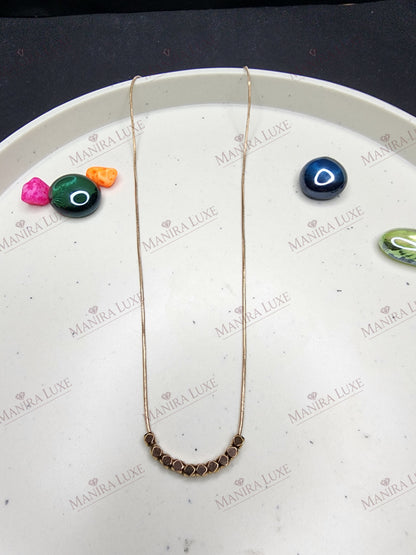 TESSELLA SMILE ROSE GOLD NECKLACE