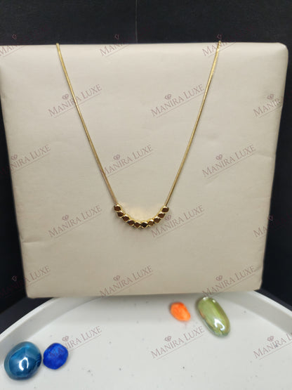 LUMINOUS GEOMETRY GOLD NECKLACE