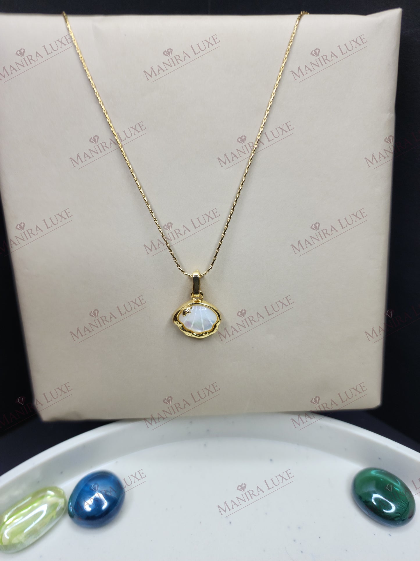 LUMINOUS TIDE GOLD NECKLACE