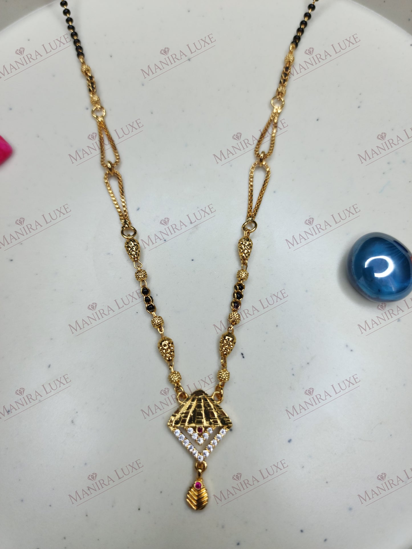 THE PRISM PETAL GOLD MANGALSUTRA