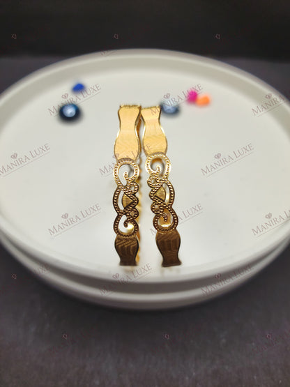 ETERNAL FLOW GOLD BANGLES
