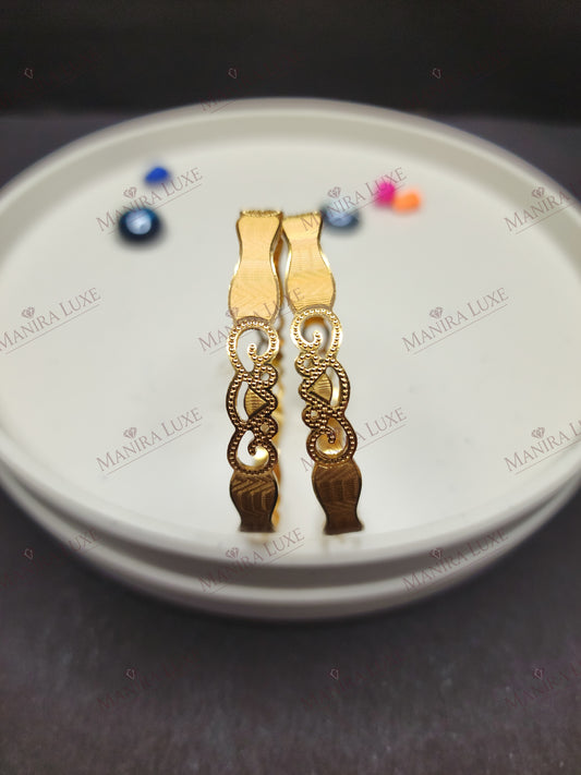 ETERNAL FLOW GOLD BANGLES