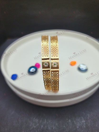 THE GILDED TRELLIS GOLD BANGLES