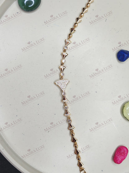 STELLAR CREST GOLD BRACELET
