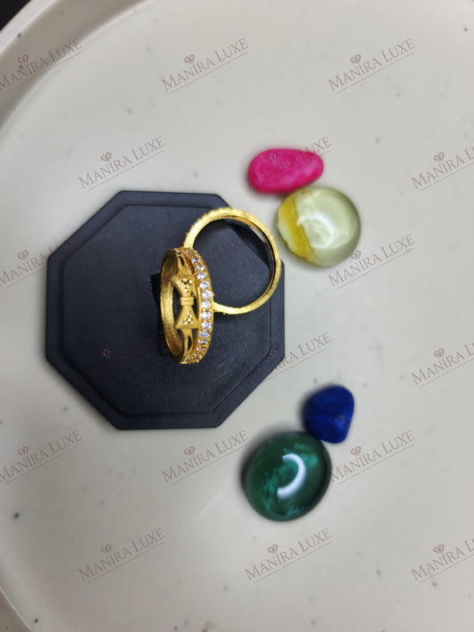 AURIC RIBBON GOLD RINGS