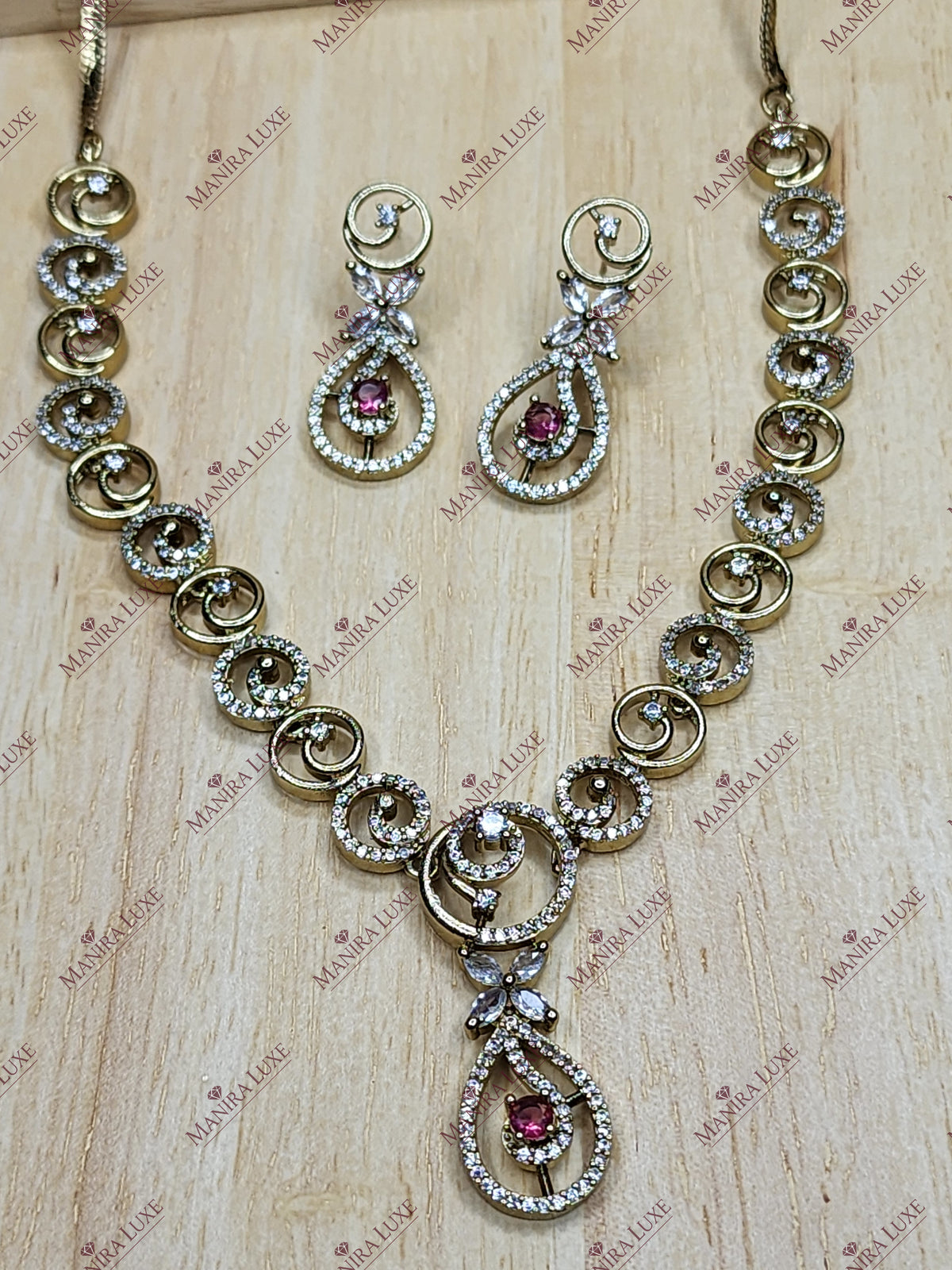 CRIMSON PETAL WHIRL GOLD NECKLACE WITH EARRINGS