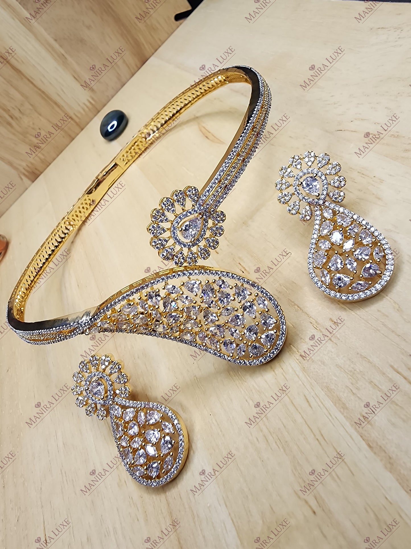 THE GILDED PAISLEY BYPASS GOLD & SILVER NECKLACE WITH EARRINGS