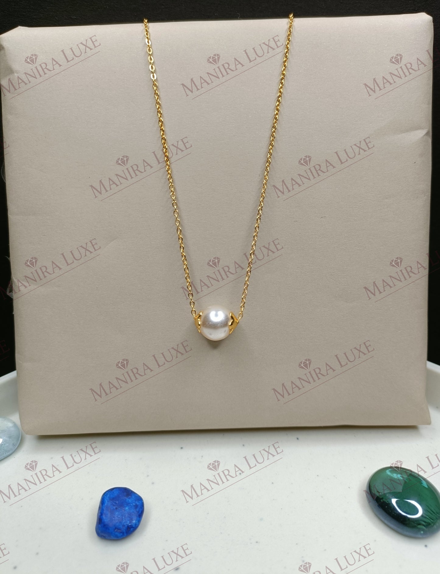 THE LUMINA STRAND NECKLACE