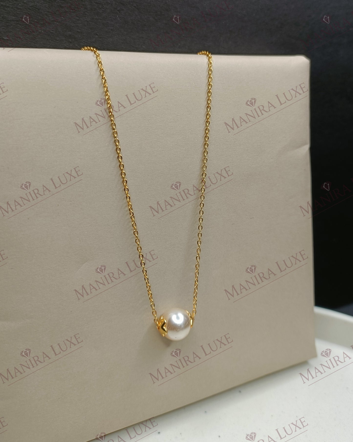 THE LUMINA STRAND NECKLACE