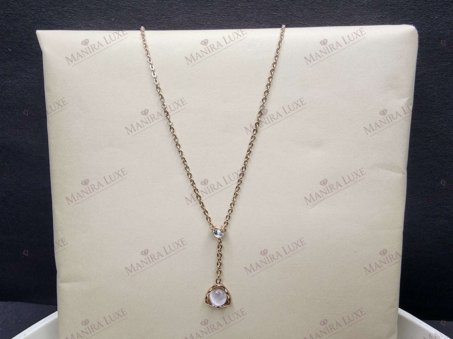 STELLAR PENDULUM ROSE GOLD NECKLACE